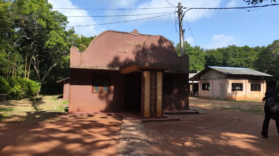 Small meditation building surrounded by trees in Sri Lanka